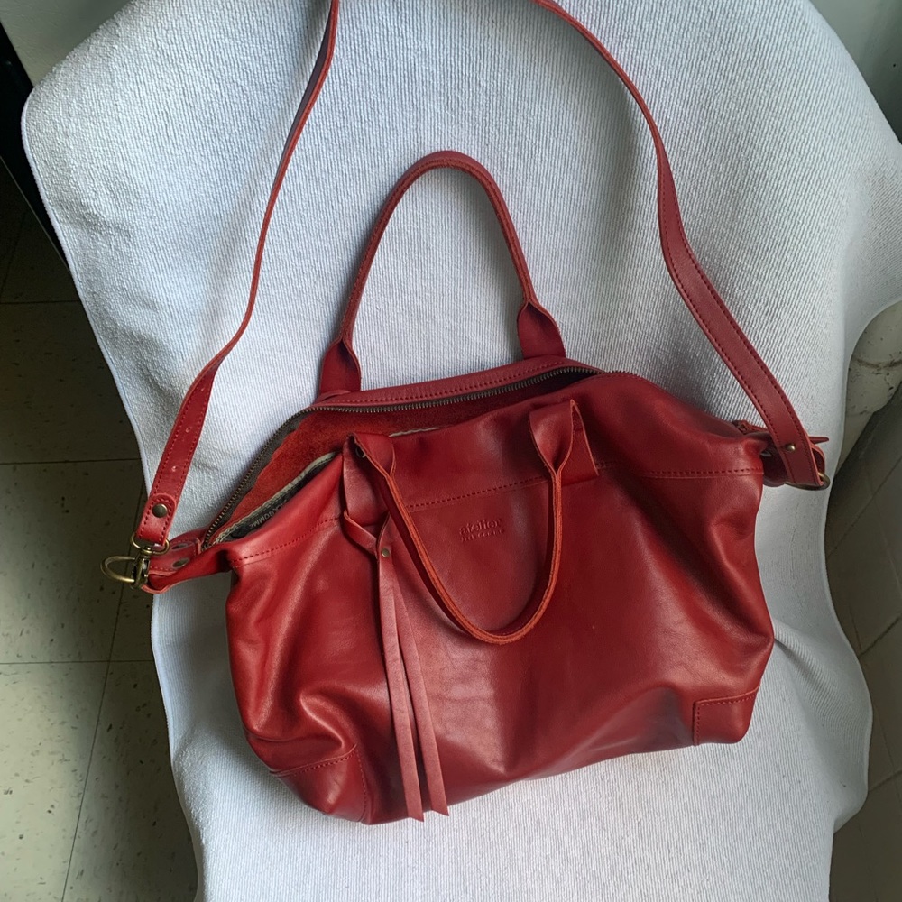 Atelier by jack Gomme red bag with long strap and handles